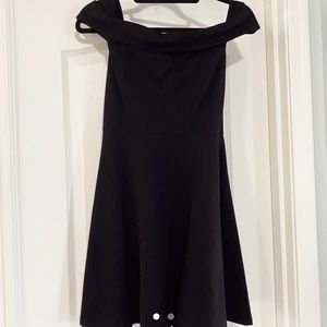 Black formal dress. Never worn. Zipper on back. Mini length